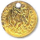 This “touch piece” looks like a gold coin used in spending, but it was actually used while healing sick people. The touch piece was found on farmland in Wales.  