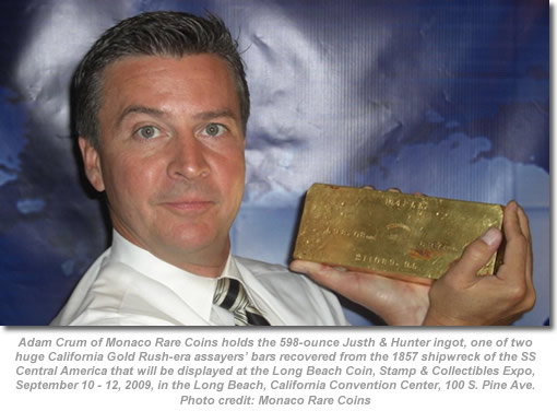 Adam Crum holds 598-ounce Justh & Hunter gold ingot