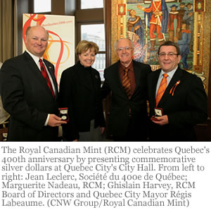 The Royal Canadian Mint (RCM) celebrates Quebec's 400th anniversary by presenting commemorative silver dollars at Quebec City's City Hall. From left to right: Jean Leclerc, Société du 400e de Québec; Marguerite Nadeau, RCM; Ghislain Harvey, RCM Board of Directors and Quebec City Mayor Régis Labeaume. (CNW Group/Royal Canadian Mint)