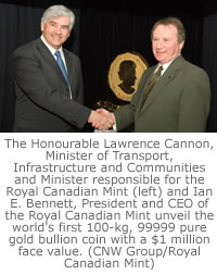 The Honourable Lawrence Cannon, Minister of Transport, Infrastructure and Communities and Minister responsible for the Royal Canadian Mint (left) and Ian E. Bennett, President and CEO of the Royal Canadian Mint unveil the world's first 100-kg, 99999 pure gold bullion coin with a $1 million face value. (CNW Group/Royal Canadian Mint)