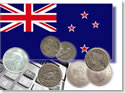 New Zealand flag, calculator and silver coins