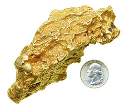 The Fullerton Boulder next to 25c