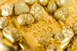 Gold nuggets and bar