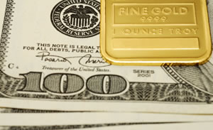 Fine gold bar, US $100 bills
