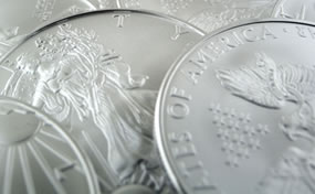 Gold Gains on China Inflation, US Mint Silver Bullion Coins Jump
