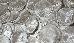 Mound of American Eagle silver coins