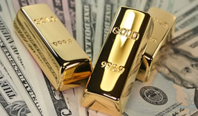 Three gold bars on US bills