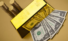 US bills, gold bar and coins