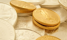 Gold, Silver Prices Soar on Week; US Mint Bullion Coins Split