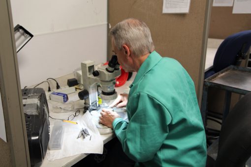 Tom Larizzio Inspecting and Cleaning Coin Die