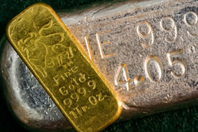 Gold bar on top of silver bar