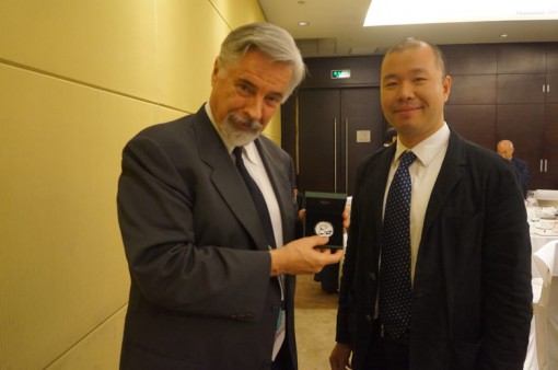 David Hall (holding 2014 Panda coin) and Rocky Zhou