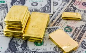 US Dollars and Gold Bullion Bars