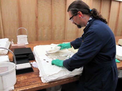 Ruvo demonstrates the preparation of blanks prior to the stamping process.