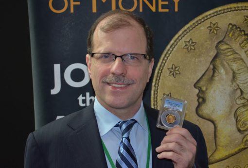 Brian Hendelson with 1879 Stella gold coin