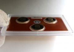 Edge View of Lens Holding 2016 Presidential $1 Proof Coins
