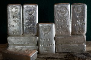 silver bars stacked side by side