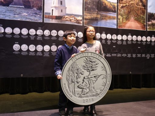 PB children pose replica quarter