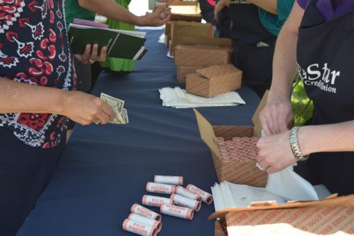 Rolls of Voyageurs quarters are exchanged