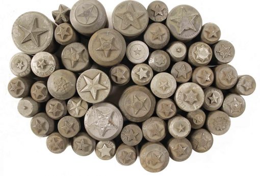 5-point star dies hubs from the Northwest Territorial Mint Historical Token Die Collection