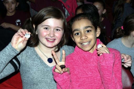 Fourth Graders at Lowell quarter ceremony receive free coin