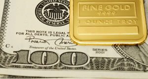 Gold, Silver Rise on Fed Rate Pledge; US Gold Coins Gain Fine gold bar, US $100 bills