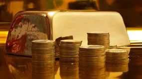 Gold Adds $9.90, Silver Dips 6.7 Cents, US Gold Coins Advance Gold bar and gold coins