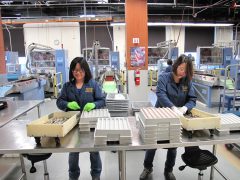 SF Mint Employees Racking Coin Blanks