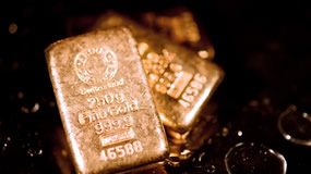 Gold Dips 0.2%, Silver Slides 0.5% 999.9 gold bullion, three bars