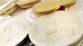 Gold, Silver Fall on Week; US Mint Bullion Sales Steady Gold Eagle and Silver Eagle bullion coins