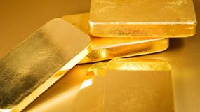 Gold Nearly Flat, US Mint Bullion Sales Rise Slim gold bars