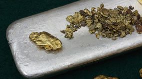 Gold Edges Up, US Mint Silver Bullion Coins Gain Gold Nuggets, Silver Bar