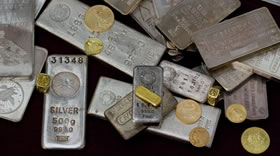 Gold and silver bars, gold coins