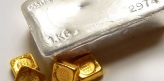 Gold and Silver Rise Ahead of Fed Meeting, Up for Second Session Silver bullion bar, four gold bullion bars