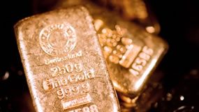 Gold Gives Back Some Gains; US Mint Gold Bullion Coins Soar Two gold bullion bars