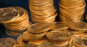Gold Rebounds from 3-Year Low, Down on Week; US Gold Coins Up US Mint Eagle Gold Coins