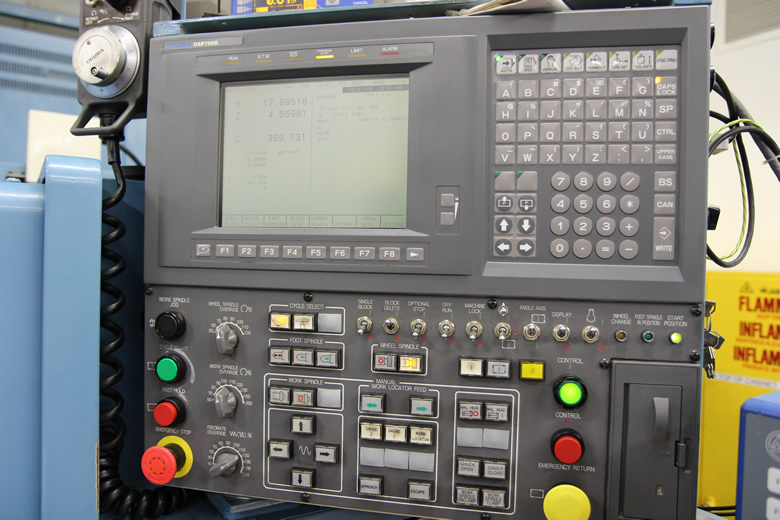 Sean Calhoun Operating Laser Serializer Machine at Denver Mint