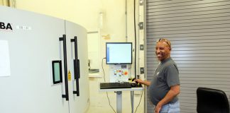 How the Denver Mint Makes Dies to Produce Coins Sean Calhoun Operating Laser Serializer Machine at Denver Mint