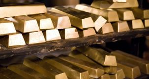 Gold Retreats, Silver Rises; US Bullion Coins Advance Shelves of gold bullion bars
