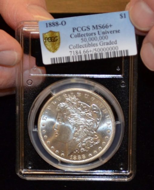 Don Willis places 50M label on Morgan silver dollar holder