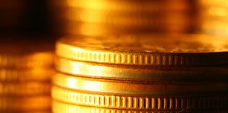 Gold Prices Rise on Week, US Mint Silver Bullion Coin Sales Solid Edges of Gold Coins