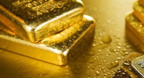 Gold Slips from 4-Month High; US Gold and Silver Eagles Rise Gold Bullion, five bars