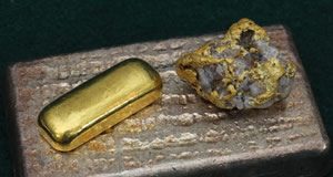 Gold and Silver Rise; US Mint Bullion Coins Gain Widely Large silver bullion bar, smaller gold bar and nugget