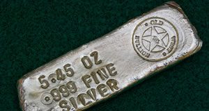 Gold Logs Weekly Gain, Silver Falls, US Mint Coins Solid 5.46 oz silver bar