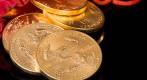 Gold, Silver Fall on Week; US Mint Bullion Sales Rise Sharply American Eagle bullion coins