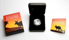 Illustrated Shipper, Coin and Presentation Case, and folded Certificate of Authenticity
