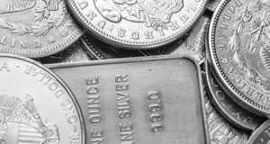 Gold Marks 3-Week Low, Falls Below $1,300 Silver coins and silver bullion bar
