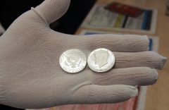 2014-S Enhanced Uncirculated Kennedy Half-Dollar Silver Coin Held in Hand