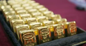 Gold and Other Precious Metals Dive; US Coins Gain Rows of gold bullion