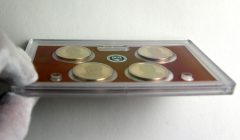 Edge View of Lens Holding 2015 Presidential $1 Proof Coins